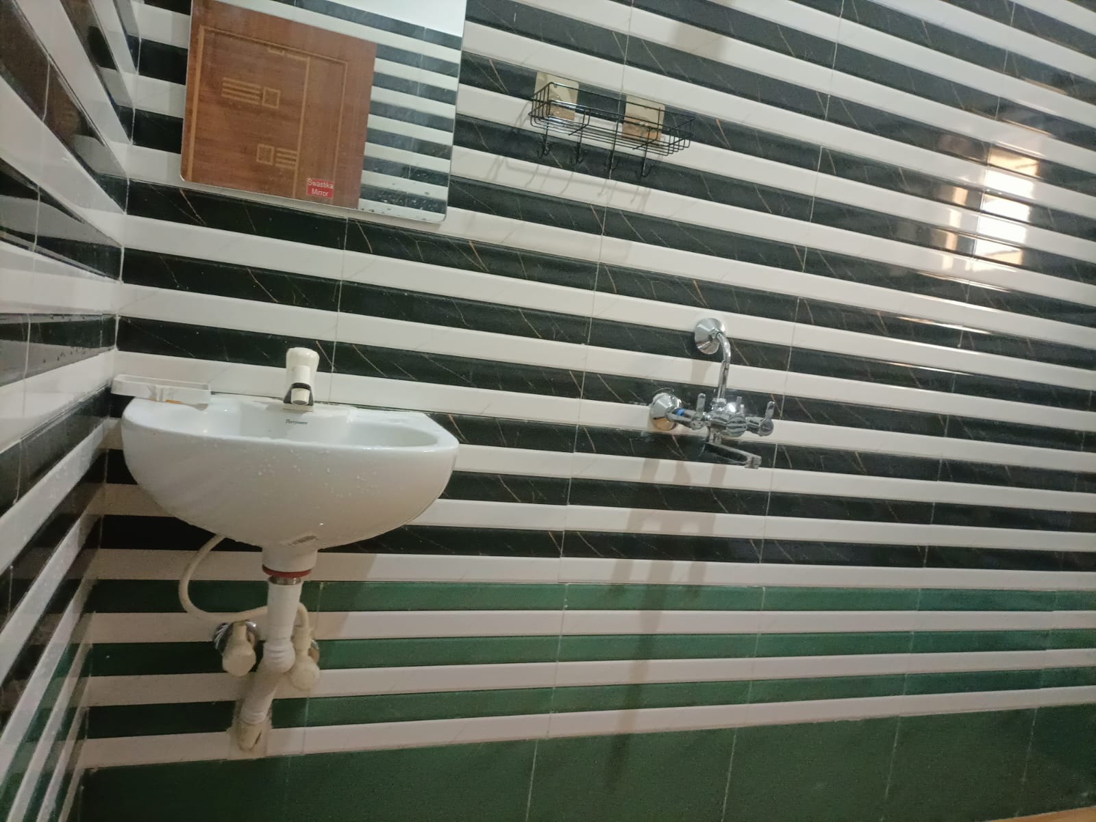 Bathroom with clean tiles and sink