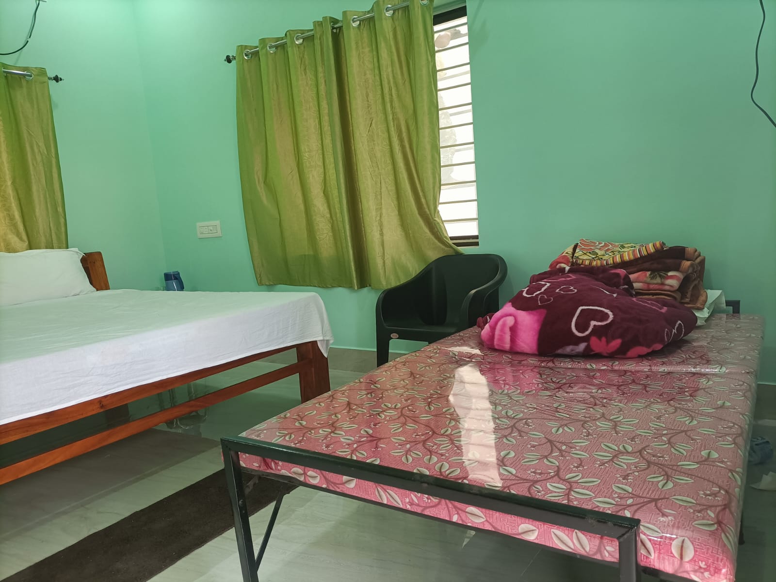 Bedroom with cane furniture and daylight